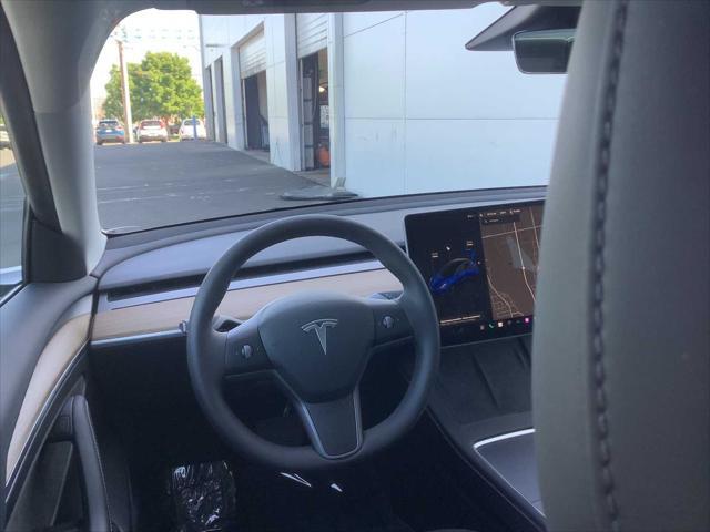 used 2022 Tesla Model 3 car, priced at $30,279