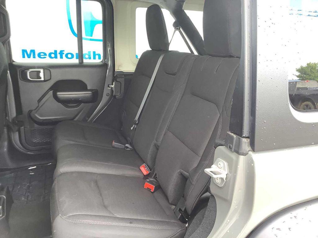 used 2023 Jeep Wrangler car, priced at $29,487
