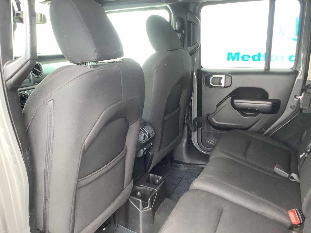 used 2023 Jeep Wrangler car, priced at $29,487