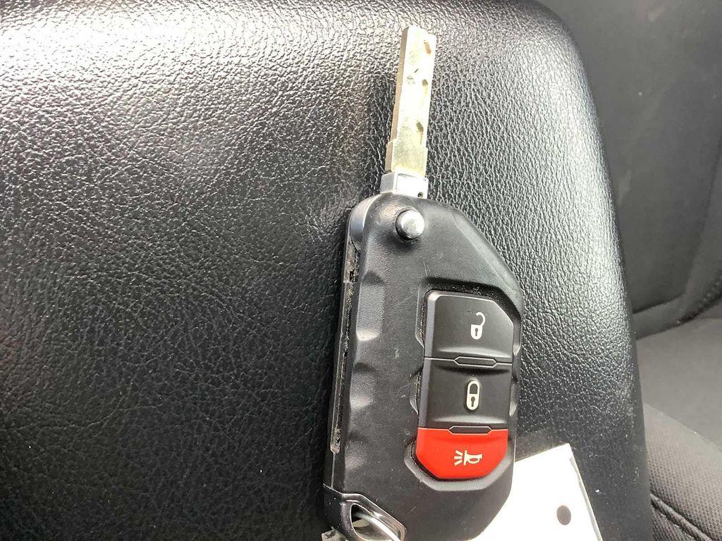 used 2023 Jeep Wrangler car, priced at $29,487
