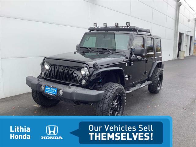 used 2016 Jeep Wrangler Unlimited car, priced at $24,976