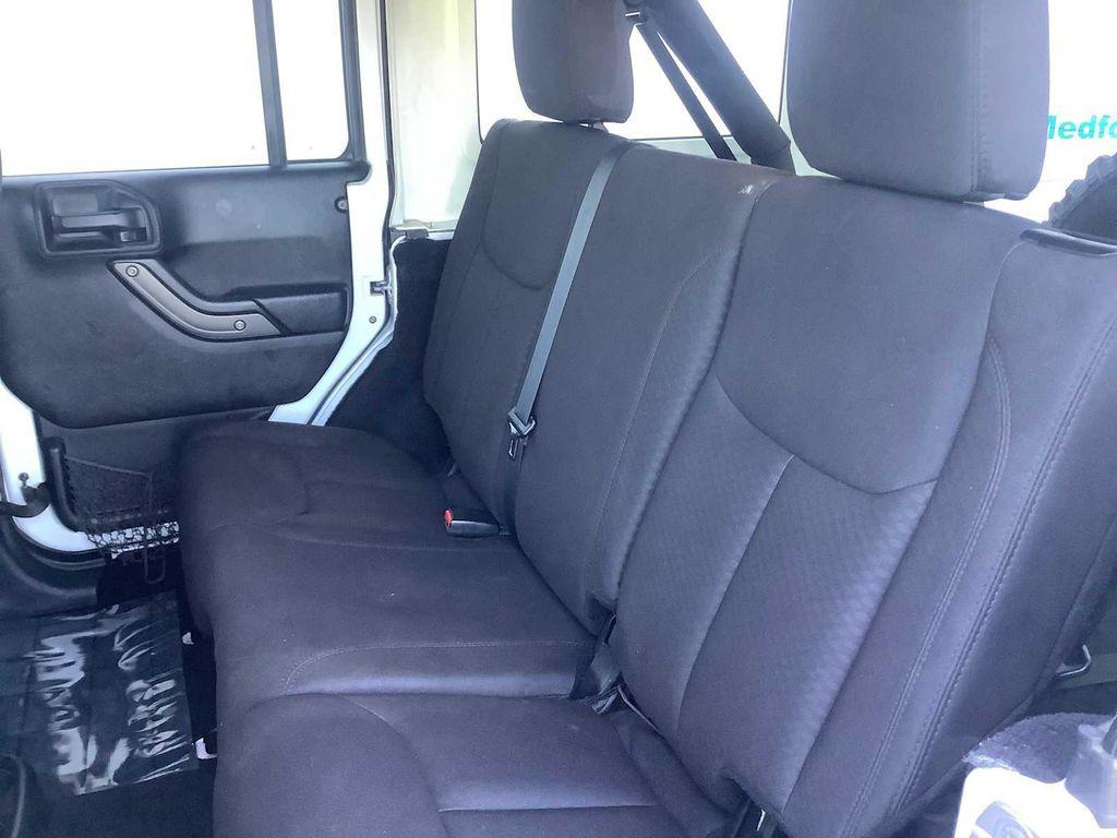 used 2014 Jeep Wrangler Unlimited car, priced at $15,526
