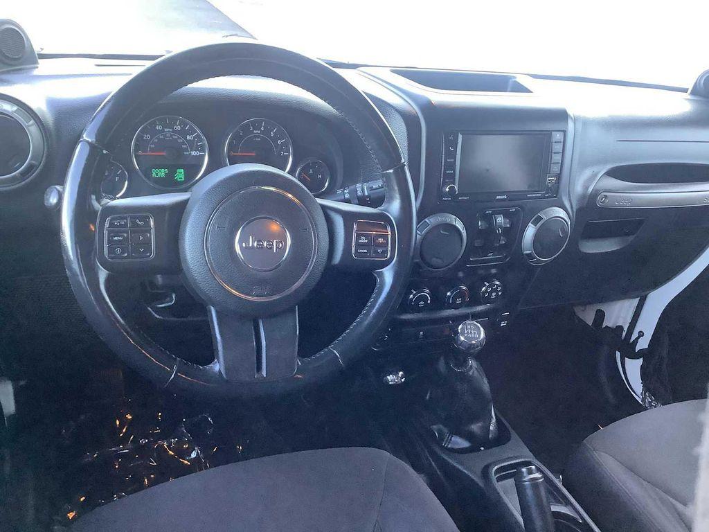 used 2014 Jeep Wrangler Unlimited car, priced at $15,526