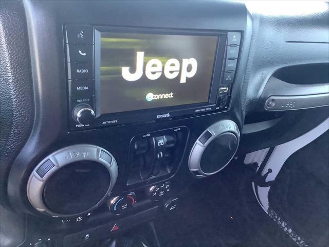 used 2014 Jeep Wrangler Unlimited car, priced at $19,984