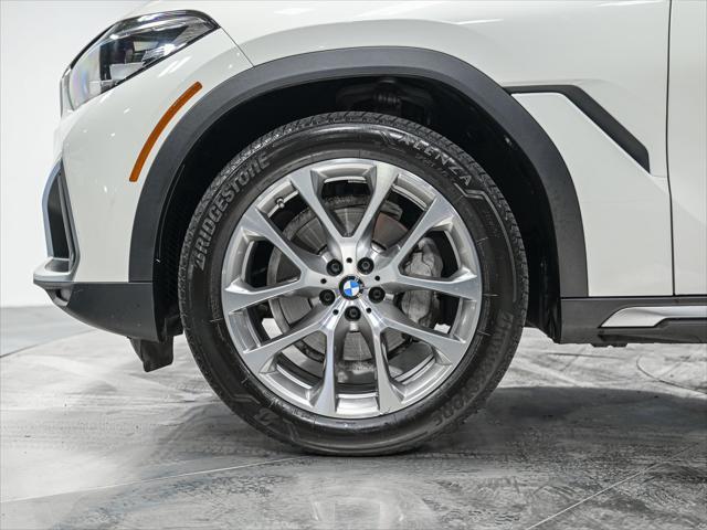 used 2023 BMW X6 car, priced at $57,486