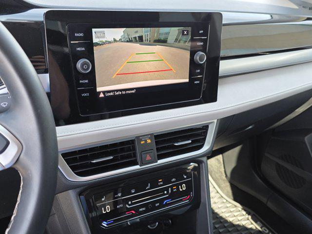 used 2025 Volkswagen Taos car, priced at $25,995