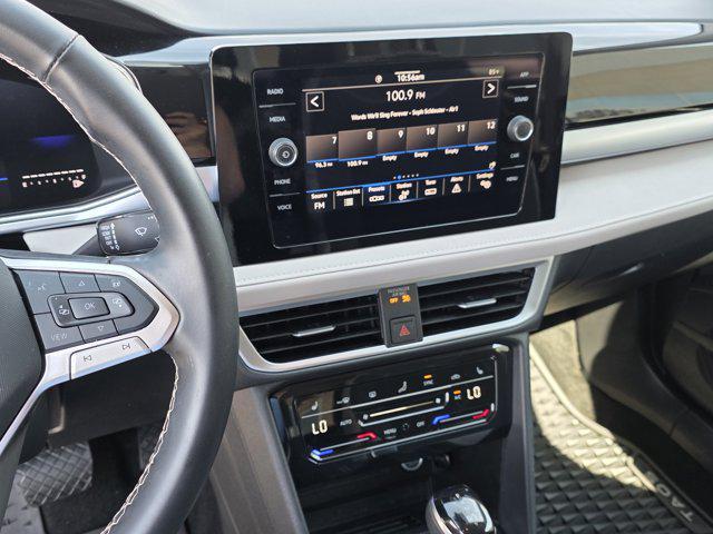 used 2025 Volkswagen Taos car, priced at $25,995