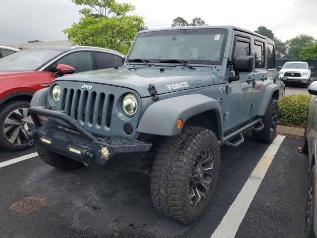 used 2015 Jeep Wrangler Unlimited car, priced at $19,115