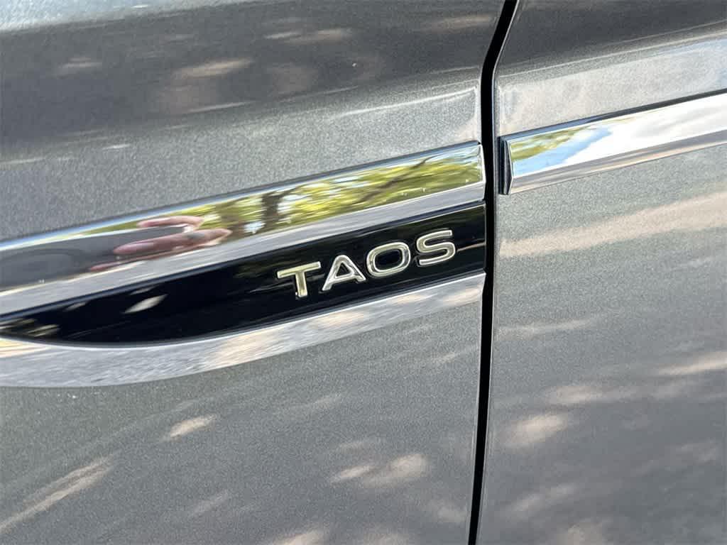 used 2022 Volkswagen Taos car, priced at $18,359