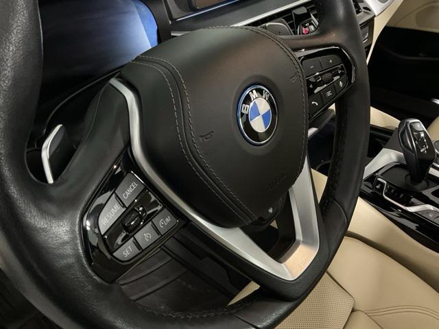 used 2023 BMW 530e car, priced at $43,674