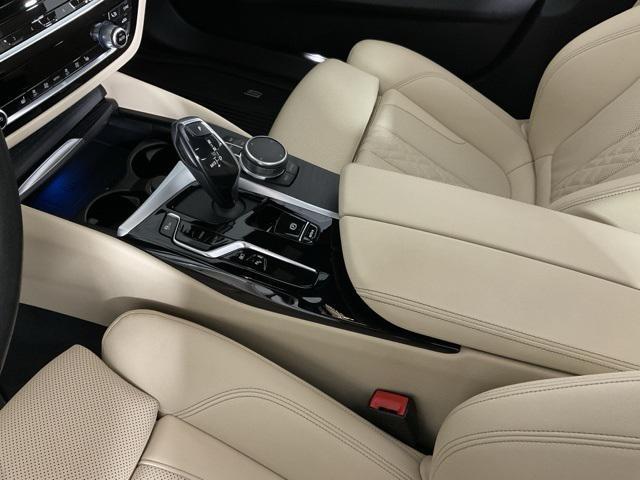 used 2023 BMW 530e car, priced at $43,674