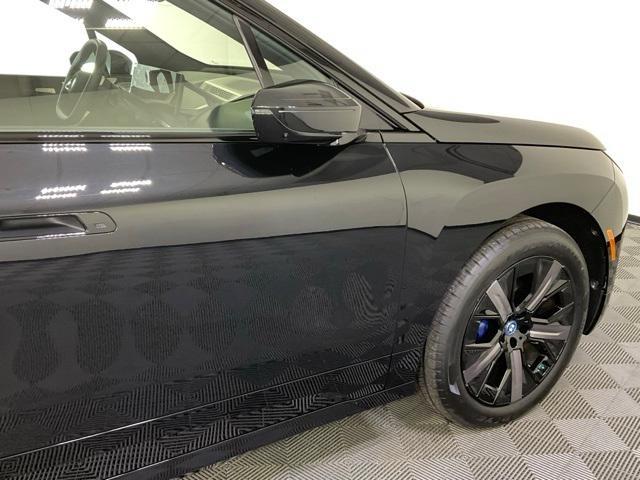 new 2024 BMW iX car, priced at $99,995