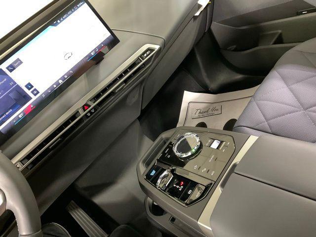 new 2025 BMW iX car, priced at $120,320