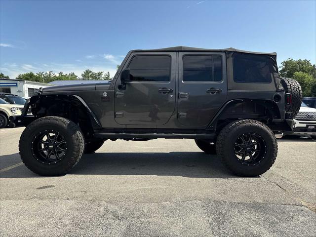 used 2014 Jeep Wrangler Unlimited car, priced at $18,990