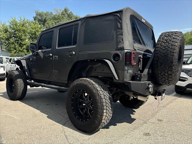 used 2014 Jeep Wrangler Unlimited car, priced at $18,990