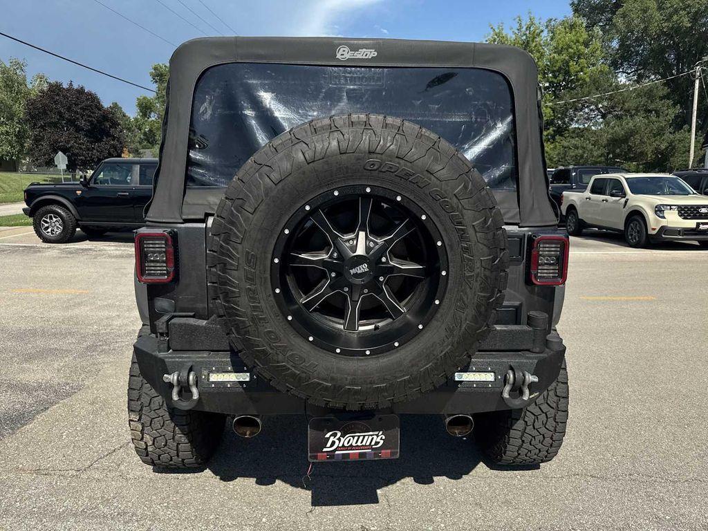 used 2014 Jeep Wrangler Unlimited car, priced at $17,490