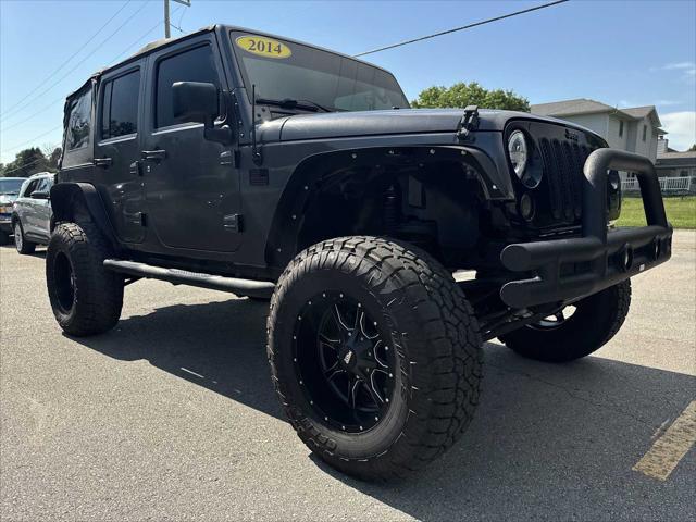 used 2014 Jeep Wrangler Unlimited car, priced at $18,990