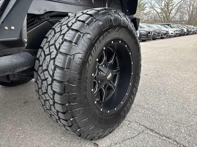 used 2014 Jeep Wrangler Unlimited car, priced at $19,990