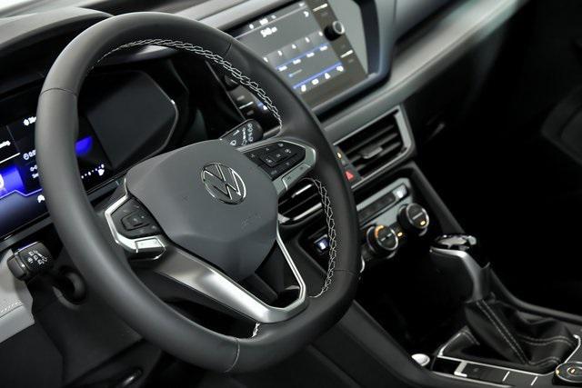 used 2024 Volkswagen Taos car, priced at $26,833