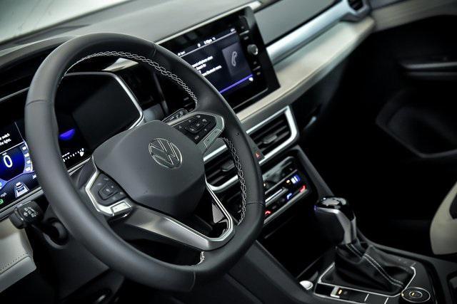 new 2025 Volkswagen Taos car, priced at $27,736
