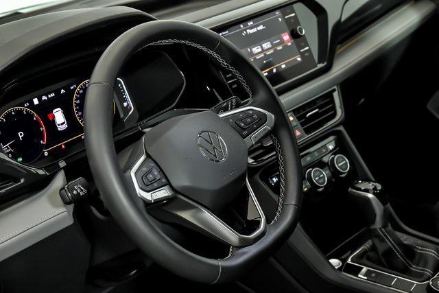 used 2022 Volkswagen Taos car, priced at $24,599