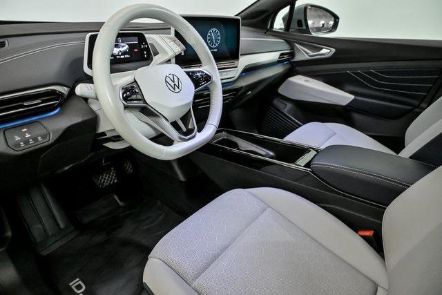 used 2023 Volkswagen ID.4 car, priced at $25,699