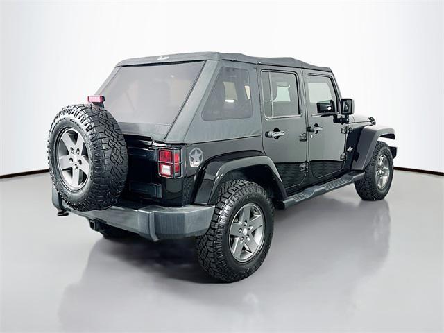 used 2013 Jeep Wrangler Unlimited car, priced at $15,067