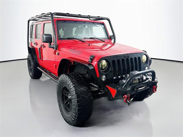 used 2014 Jeep Wrangler Unlimited car, priced at $15,888