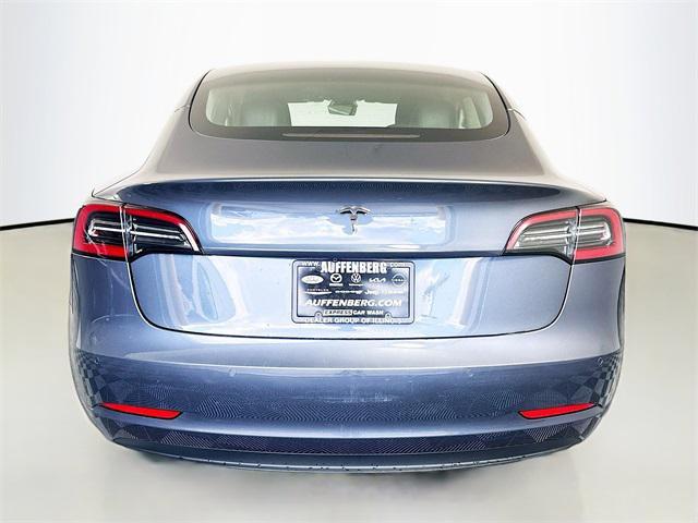 used 2022 Tesla Model 3 car, priced at $15,994