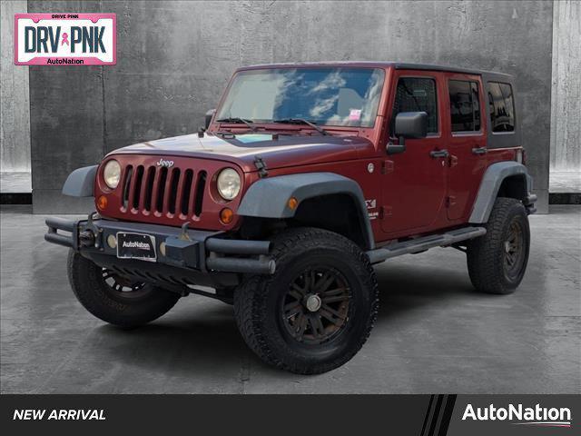 used 2009 Jeep Wrangler Unlimited car, priced at $16,991