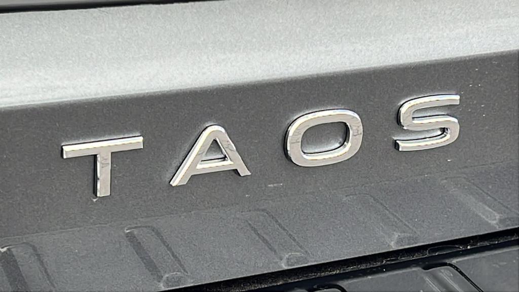 new 2024 Volkswagen Taos car, priced at $25,089