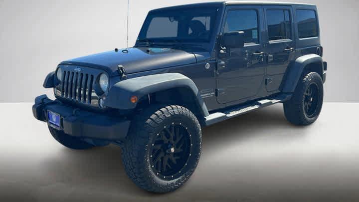 used 2014 Jeep Wrangler Unlimited car, priced at $15,487