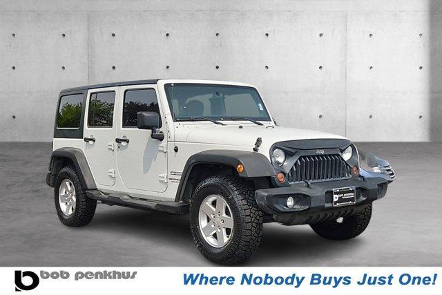 used 2012 Jeep Wrangler Unlimited car, priced at $17,799