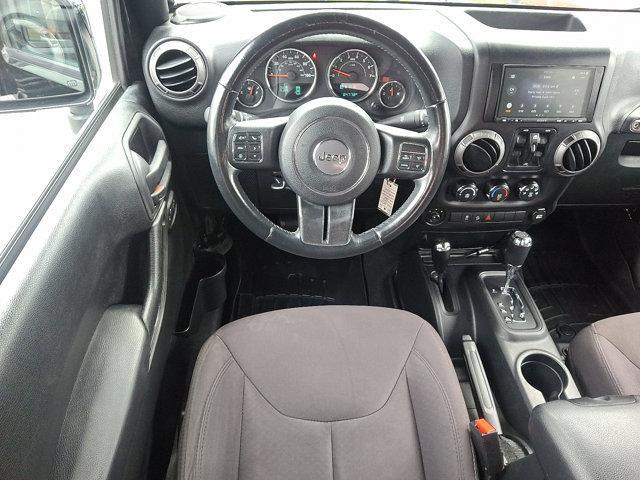 used 2015 Jeep Wrangler Unlimited car, priced at $18,990