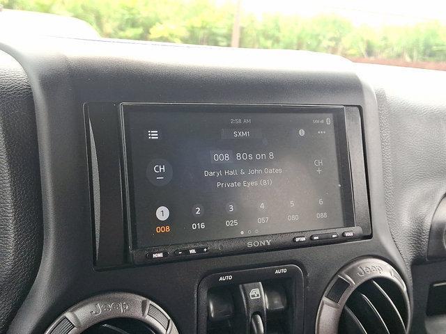 used 2015 Jeep Wrangler Unlimited car, priced at $18,990