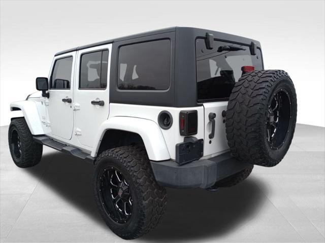 used 2015 Jeep Wrangler Unlimited car, priced at $21,455