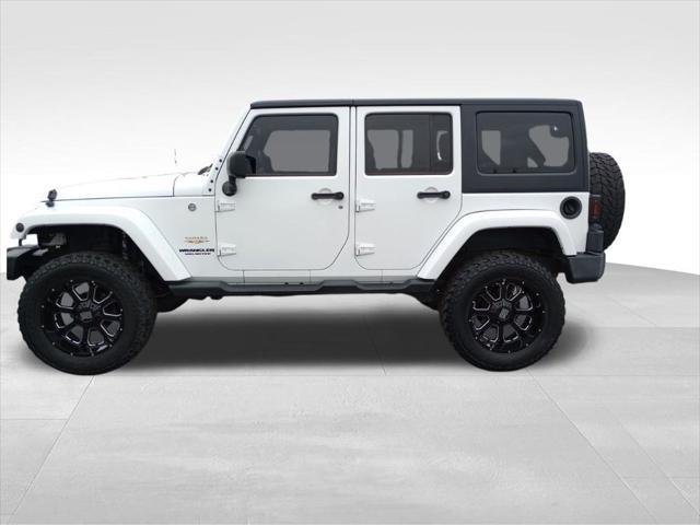 used 2015 Jeep Wrangler Unlimited car, priced at $21,455