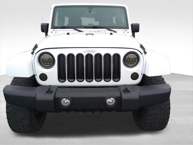 used 2015 Jeep Wrangler Unlimited car, priced at $21,455