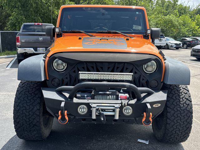 used 2012 Jeep Wrangler Unlimited car, priced at $13,995