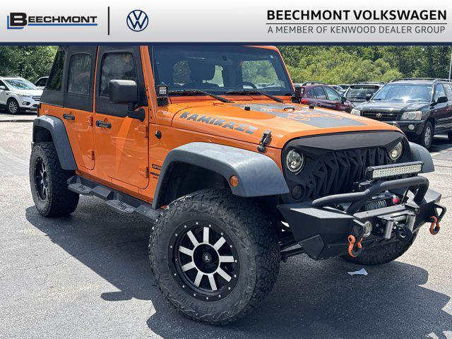 used 2012 Jeep Wrangler Unlimited car, priced at $13,995