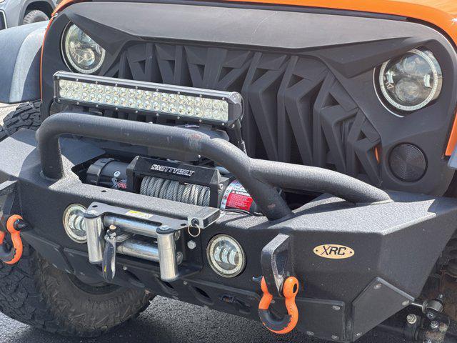 used 2012 Jeep Wrangler Unlimited car, priced at $13,995