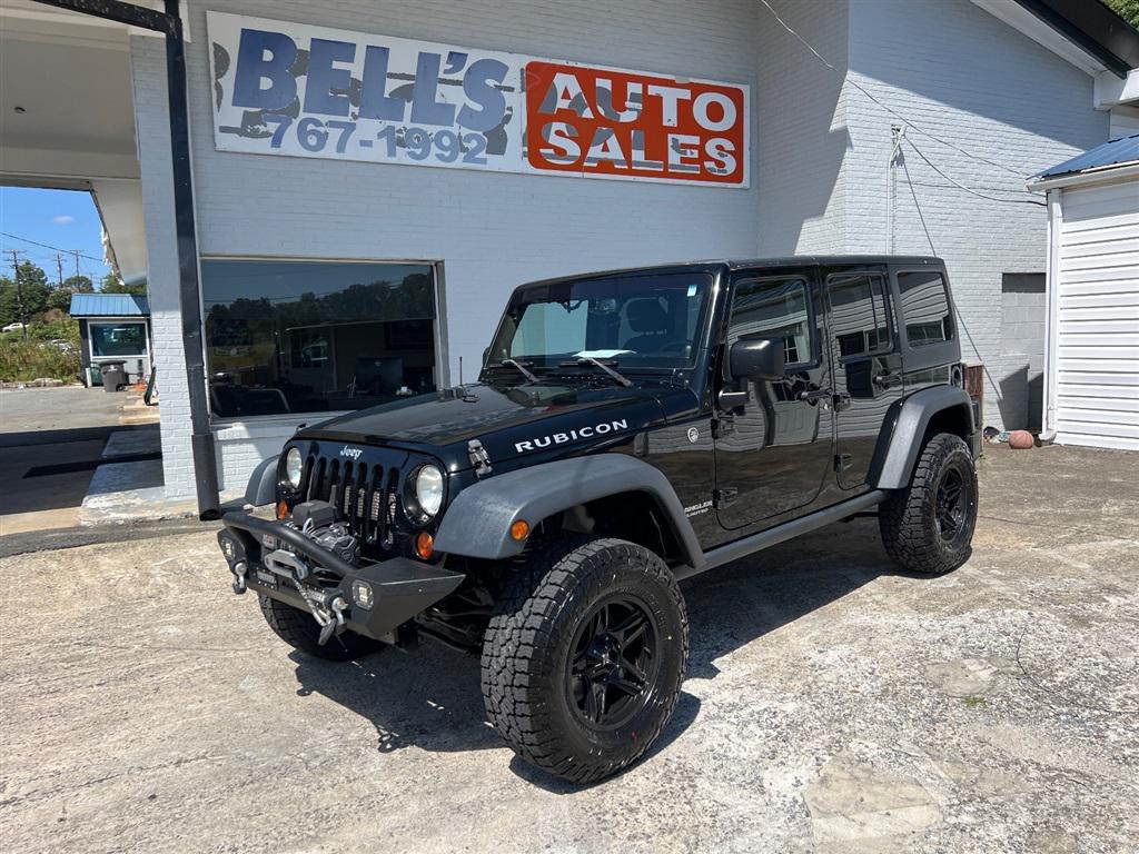 used 2013 Jeep Wrangler Unlimited car, priced at $16,270