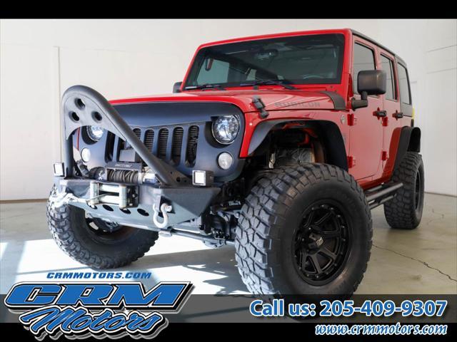 used 2014 Jeep Wrangler Unlimited car, priced at $24,709