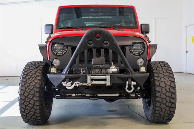 used 2014 Jeep Wrangler Unlimited car, priced at $24,709