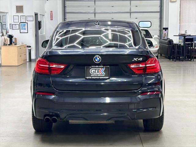 used 2015 BMW X4 car, priced at $15,497