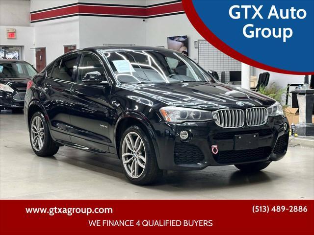 used 2015 BMW X4 car, priced at $15,497