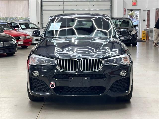 used 2015 BMW X4 car, priced at $15,497