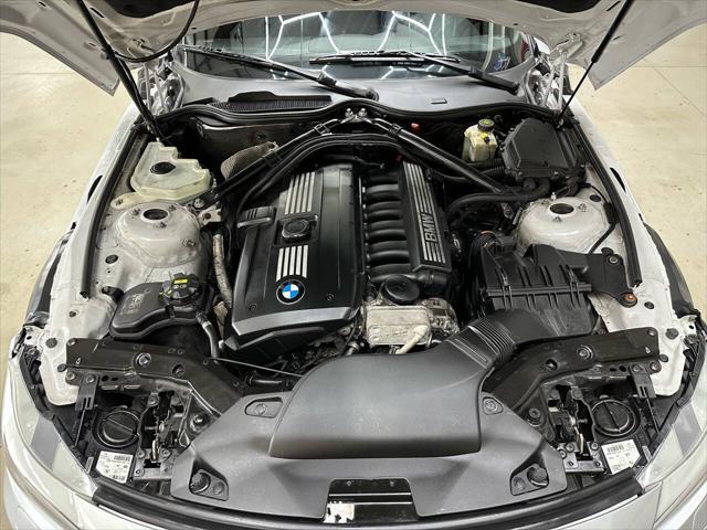 used 2011 BMW Z4 car, priced at $12,499