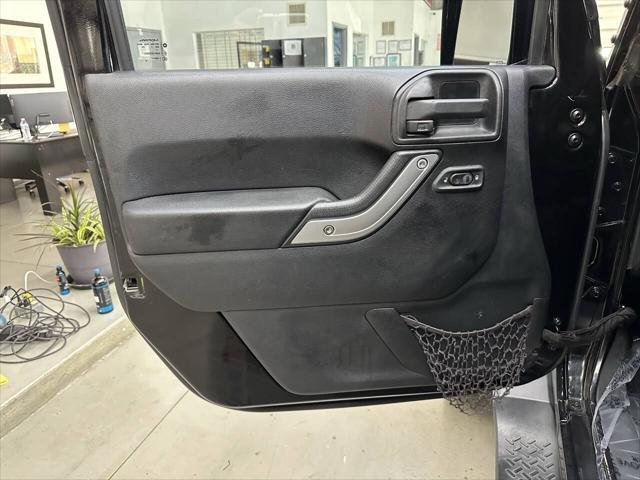 used 2016 Jeep Wrangler Unlimited car, priced at $20,997