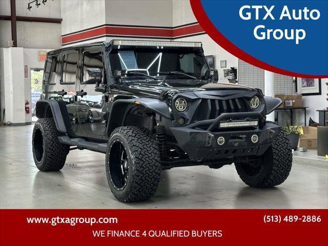 used 2016 Jeep Wrangler Unlimited car, priced at $20,997